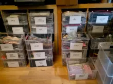 Fly tying material in white boxes