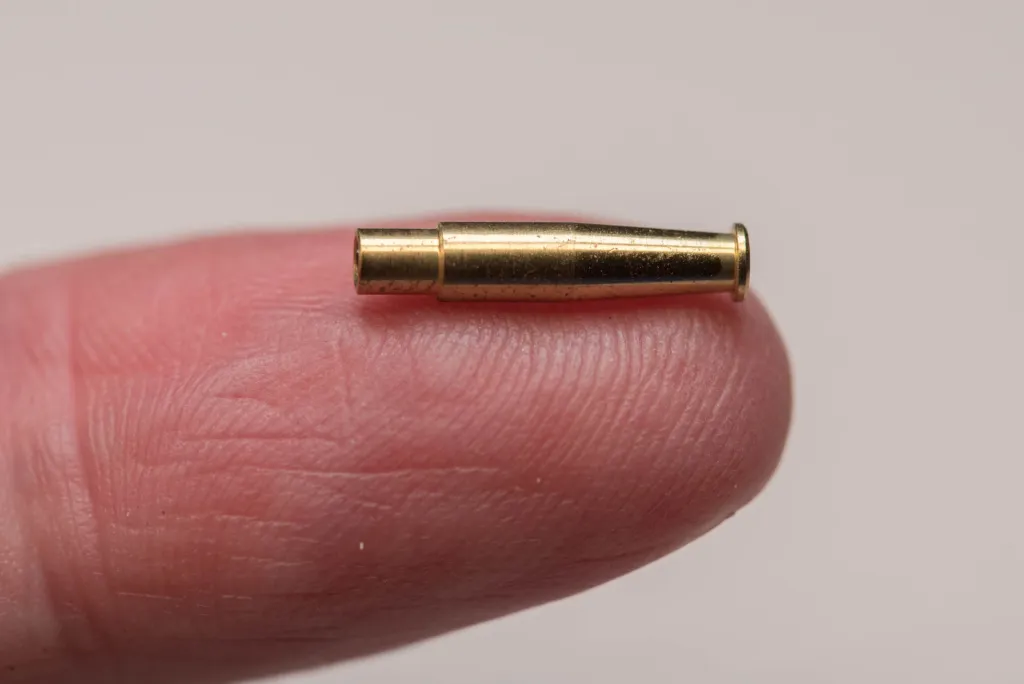 Bottle tube on a finger
