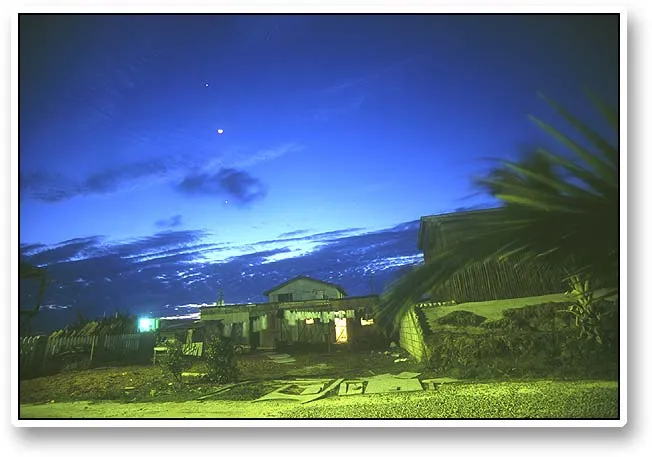Night - The view from our room in Mayas Katut was a couple of sheds where a large family lived. very night we would here guitars and chants from the open doors. A relief to the menace of the loud music from the poolside bar in the opposite direction.