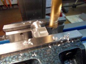 The adapter fixed in the vice on the milling table. The adapter fixed in the vice on the milling table.