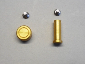 The counterbalance weight and the turning knob shaft. The counterbalance weight and the turning knob shaft.