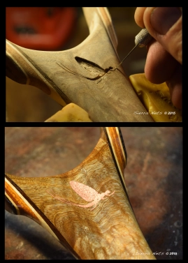 A hand-carved copper mayfly  A hand-carved copper mayfly