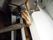 Turning the knob on a woodturning lathe. Turning the knob on a woodturning lathe.