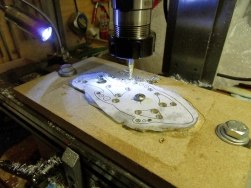 Detail of milling the outside of the fish shape face plate. Detail of milling the outside of the fish shape face plate.