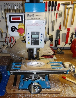 Milling the rough shape of the face/housing plate. Milling the rough shape of the face/housing plate.