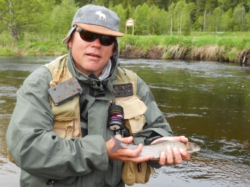The author with a Norwegian grayling taken on an F&K Caddis The author with a Norwegian grayling taken on an F&K Caddis