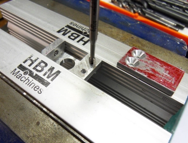 Making threaded holes in the adapter. Making threaded holes in the adapter.