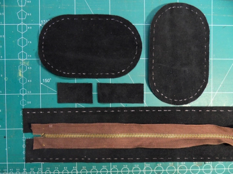 All the parts and the zipper. All the parts and the zipper.