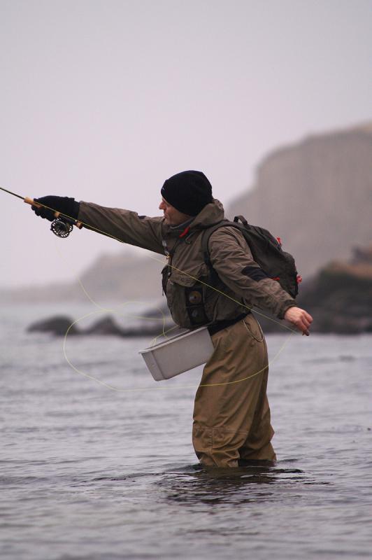 Jens casting - My fishing buddy Jens in a magnificent double haul. I like his style with both stripping basket and backpack.<br />
You get this picture in an extra large size - I like it so much!