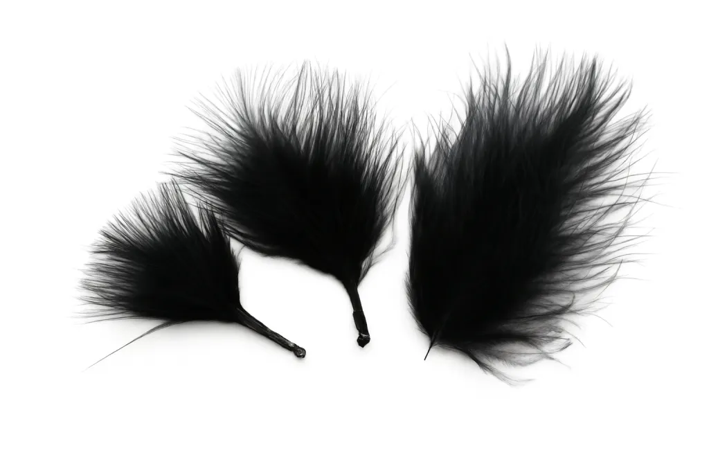 Blood, plume, stem - The three basic types of marabou feathers, left to right: blood quill, plume and stem or hackle marabou