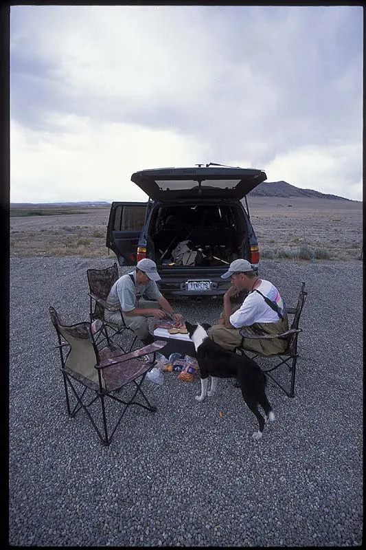 Lunch by the car - With convenient chairs and a large icebox lunch can hardly go wrong after a long morning's fishing.