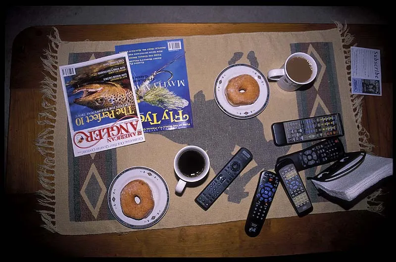 Donuts and coffee - Donuts, coffee and fly fishing magazines on Steve's living room table - home to numerous remote controls, the functions of which were far beyond our grasp. The donuts were extremely poor by the way...