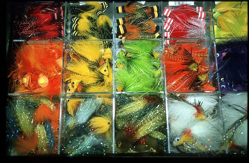 Colorful - The selection of flies is enormous as this colorful box in one booth shows. The variations seem endless.