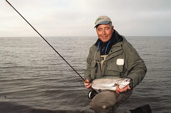 Fat rainbow - Henning with another one of the escaped rainbows, which again have populated the Danish coasts. They're great fun to catch, but still a menace and an all too common form of fauna pollution.