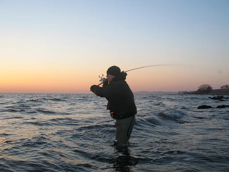 Spin fishing is popular - Anders puts lots of energy to his cast with his spinning rod.