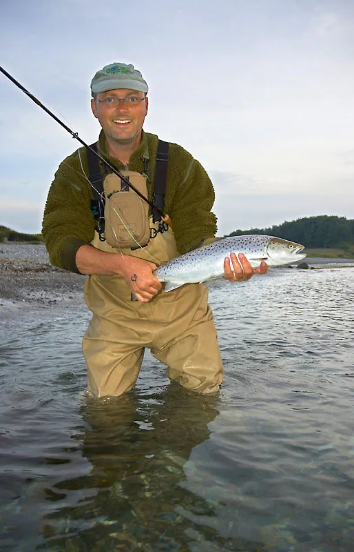After - After a trip through a photo-editing program the dark areas have been lightned and enhanced a bit, while the sky and the fish are untouched.