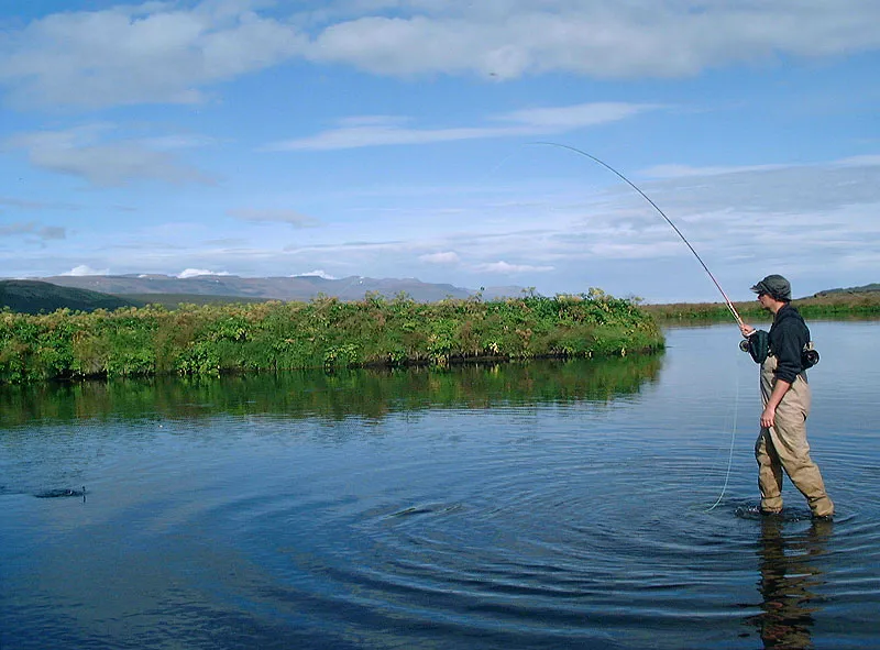 Hooked - There was a deeper run in front of the small island opposite Martin where fish would willingly take a nymph.