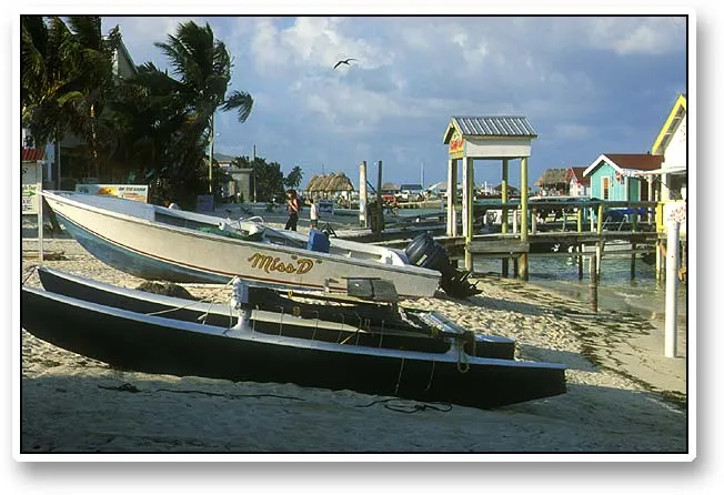 Boats on the beach - The scene on the beach is very much a scene of piers and boats. People walk along, boats come and go and the piers are central to many businesses and host shops and small restaurants.