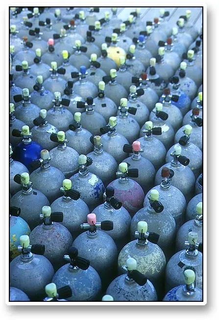 Air! - Divers need air, and air is plenty on Ambergris Caye - both natural and bottled. The oxygen bottles were lined up by the hundreds, ready for action, behind most of the dive shops on the piers.