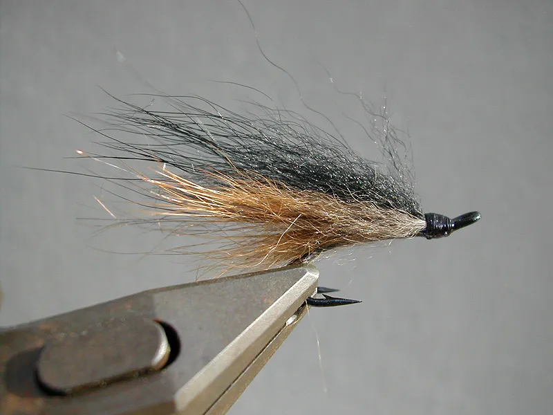 The Fox - A wet fly pattern seen in many variations. Here adapted to shape a small salmon fly.