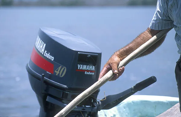 Enduro - The two main propulsion sources in Rio Lagartos: the Enduro and the pole. The Hondas are almost as numerous as the people.