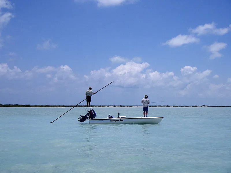 Flats boat - The typical vessel for bonefishing: open, flat bottommed, with a platform and a large outboard