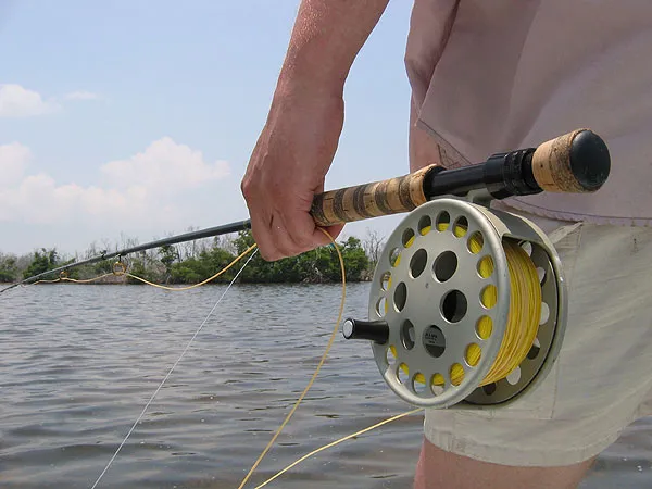 A classic - A typical position: Waiting for the tarpon in the stern of boat with fly and rod ready.