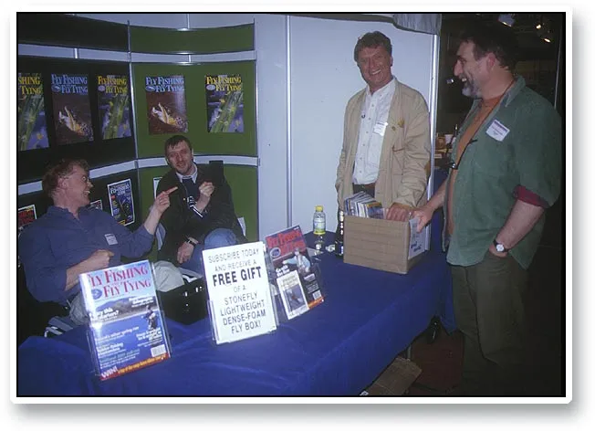 The unkept promise - Mark Bowler of Flyfishing & FlyTying, Wolfgang Küter of EuroFF@, Ole Bjerke of Partridge/Mustad and Paul Morgan of Coch-y-Bonddu Books in the booth with the unkept promise of a 'Free gift'