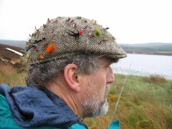 The mad hatter - Paul Morgan's hat contains enough flies for a couple of months of fishing.