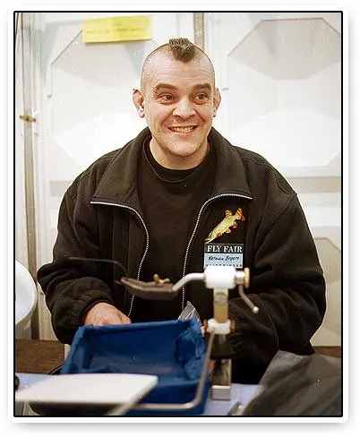 Herman Broers - The smile might be a little stiff after all the exposure. Dutch Herman Broers impressed the audience with his unusually large pike flies.