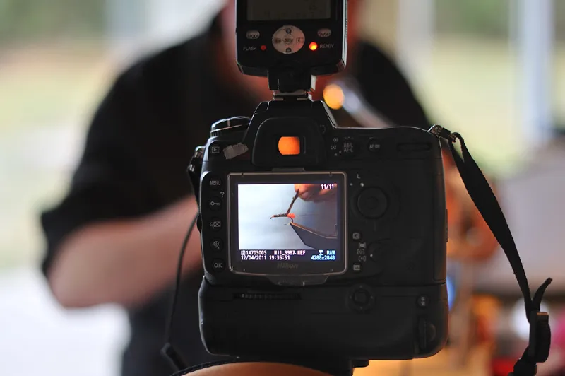 Red Tag step - A <a href="/patterns/red-tag/#1">Red Tag</a> is being tied and the process is shot with a remote release every now and then