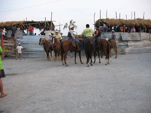 Caballeros - The cowboys waiting to be let into the arena to catch the bull after the toreodores have done their job.