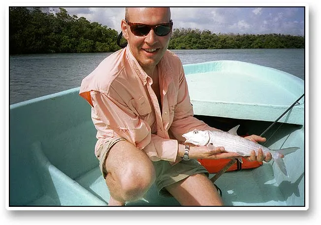 Joachim's bone - Joachim with a typical small Belizian bonefish. In spite of their size, these fish fight really well.