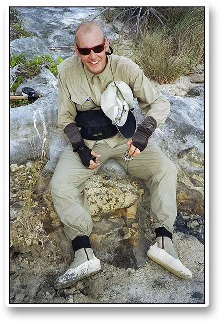 Joachim - Joachim toting a complete wading outfit from the stylish Simms flats wading boots to the not-quite-so-stylish modified socks that he used to protect his hands from sun and line wear.