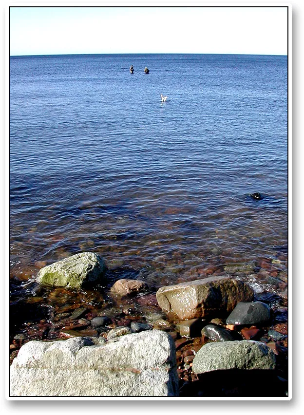 Exchanging views - Ken talking to a fellow fisher in the water. Passing fishers often take the time to exchange views. Some of us do it like this in our favorite element.