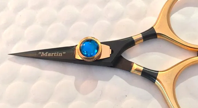 My very own scissors - Roy B. Jenkins can print your name or some other text on the blades of his razor scissors
