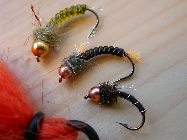 Chub nymphs - A set of nymphs that can catch chub as well as roach and bream. The top two nymphs are with Larva Lace and hare, the bottom one a Chub Nymph II with floss, copper and herl.