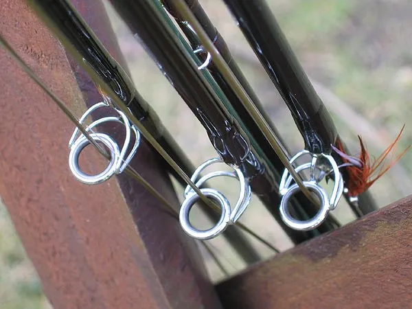 Perspective - Rods in a different angle. The fly is an Omoe Brush - a very popular Danish sea trout fly.