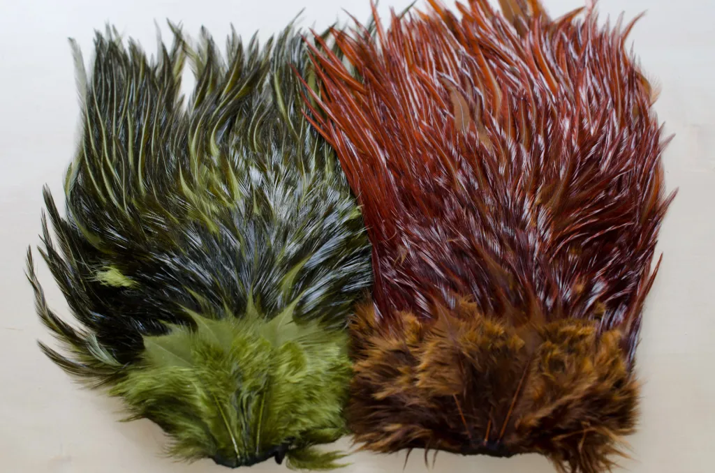 Dyed saddles - These rooster saddles are shiny and not extremely webby, but very useful for large flies for some saltwater species and pike