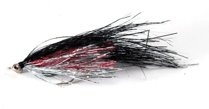 Moyerfokker - The original was tied on a hook in the 6-4-2 range. This one is simply enlarged and tied on a 4/0 hook and has the largest bead chain eyes I could find