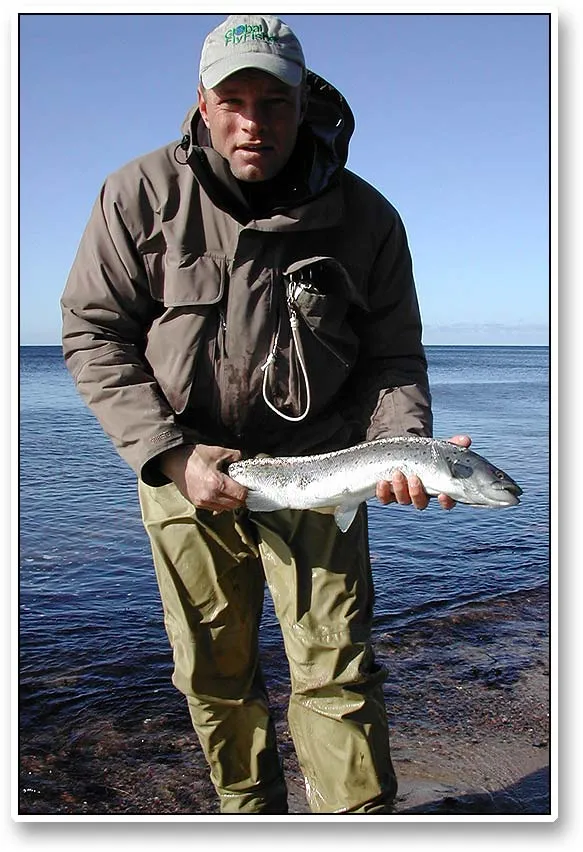 Ken with a fish - Ken with a nice fish: silvery, but slim. It has fought long, was very well hooked, but is ready to be returned to the water.