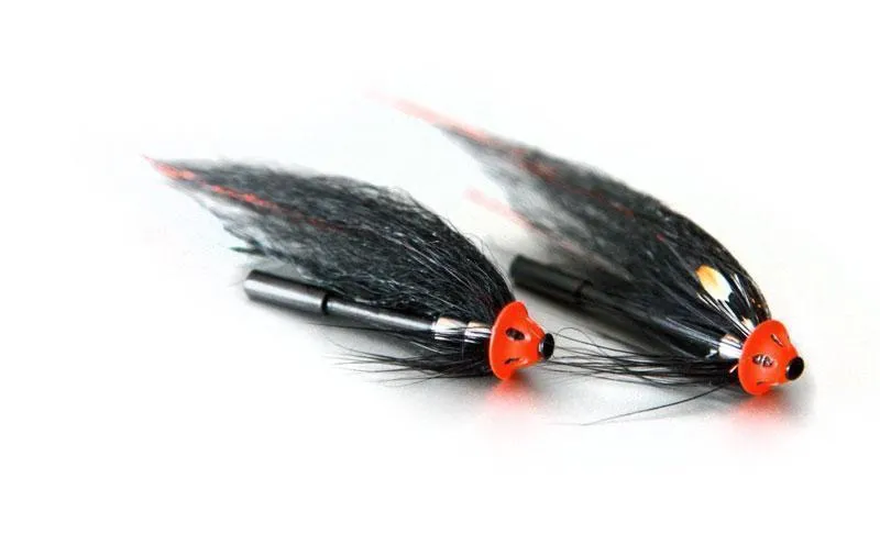 Raven NJ - The Raven NJ with and without Jungle Cock. Simple but very deadly. The small weights behind the head can be slid on the body to make a good balance. You can see a <a href=\"/patterns/raven-nj/\">full pattern description here</a>.