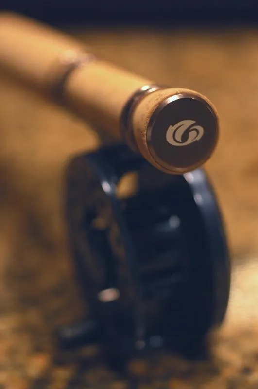 End of the rod - The full cork handle and integrated reel seat is capped by a laser-engraved aluminum end cap.