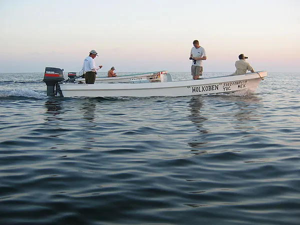 Boat - The boat style id typical: long, slender, spacey and with 40 or 60 horse power outboards.
