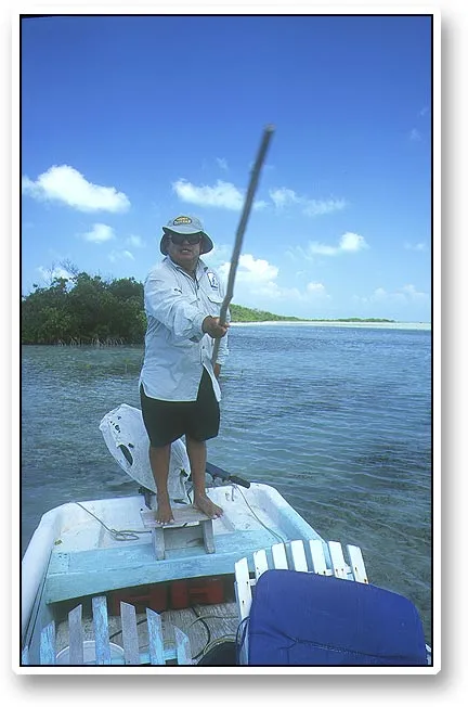 Guide - Our guide Severo doing what he does a lot and is very good at: poling the boat, scouting for fish.