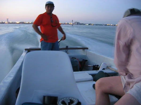 Speeding - The large outboards give the boats a good speed. Here we are leaving Rio Lagartos in the early morning.