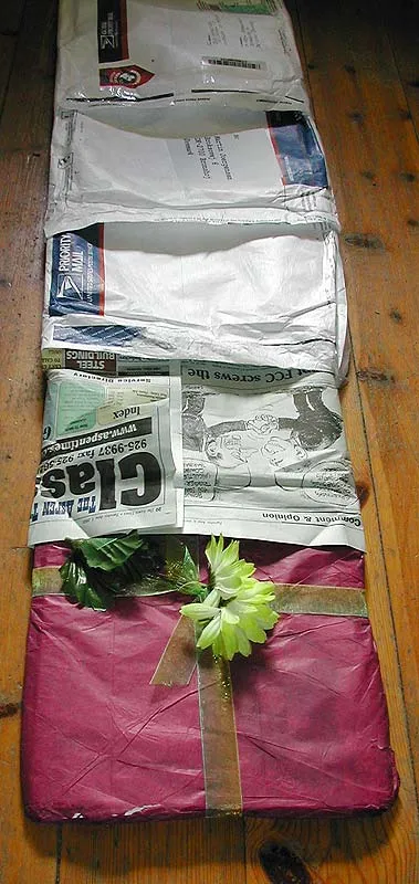 Even more - This is a true Pandora's box! Inside the envelopes are two layers of paper wrapping. Christmas evening in June!