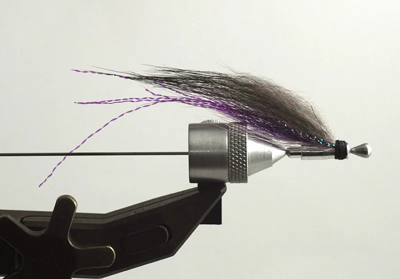 Touch of Purple - Arctic fox and purple flash on a short aluminum bottle from French André Bidoz.