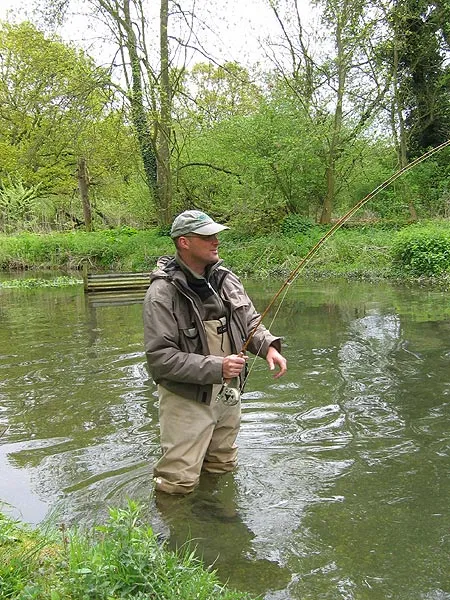 Bamboo bending - Me and my cane rod are into a good Test brown trout.
