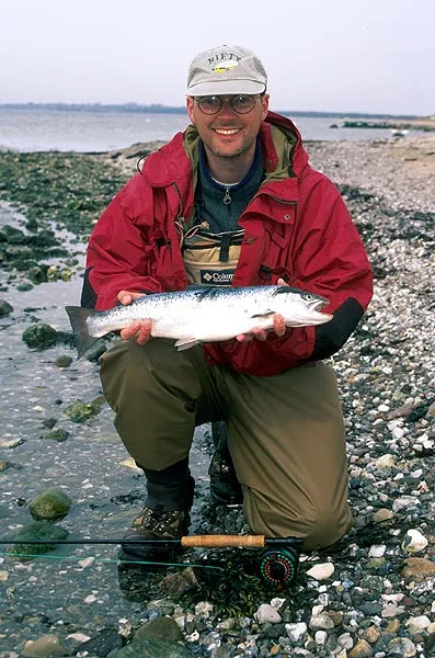 Danish pastry fish - and Danish pastry fisher - This is the first ever fish caught on the Pastry Fly.